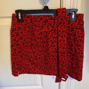 Cheetah skirt with thighs slits and a matching belt!